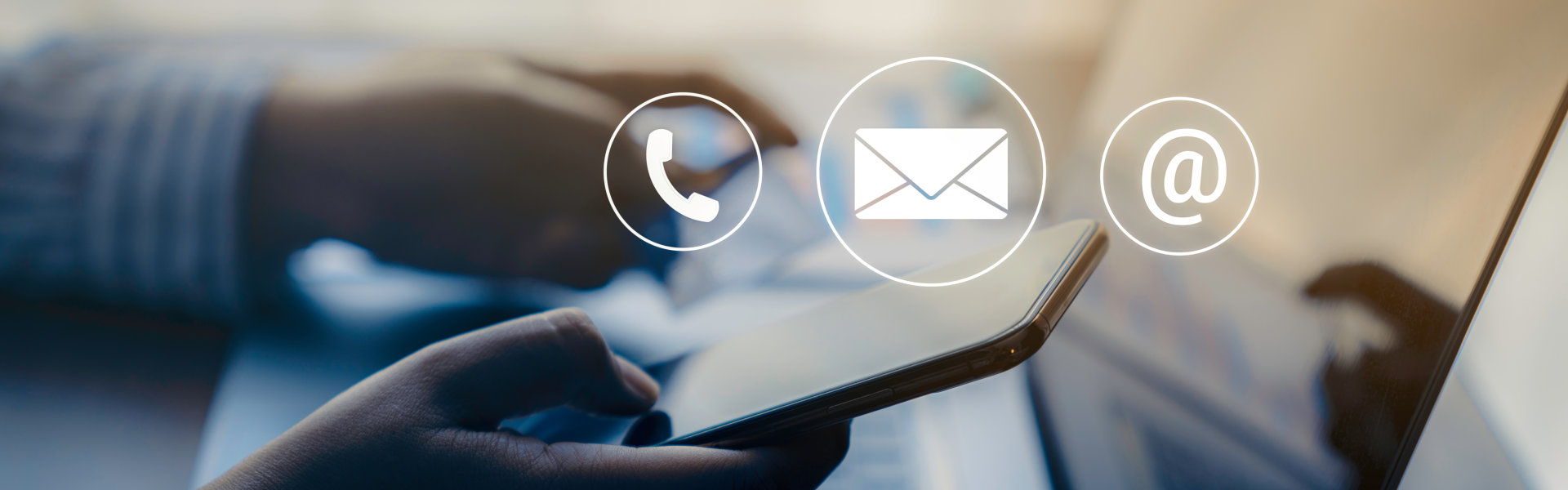 a person holding a phone with a phone and a mail icon